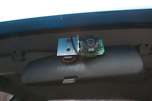 USB camera, mounted behind the rear-view mirror, used for detecting and tracking lead vehicles